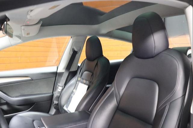 Photo of 2022 Deep Blue Metallic Tesla Model 3