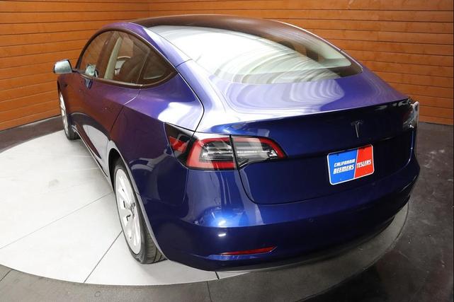 Photo of 2022 Deep Blue Metallic Tesla Model 3