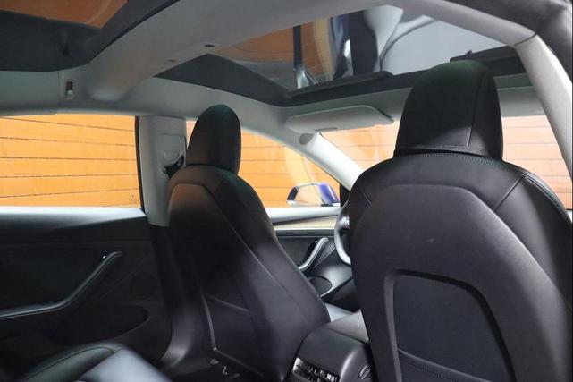 Photo of 2022 Deep Blue Metallic Tesla Model 3