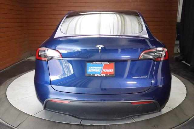 Photo of 2022 Deep Blue Metallic Tesla Model Y