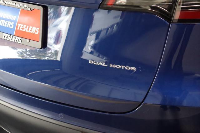 Photo of 2022 Deep Blue Metallic Tesla Model Y