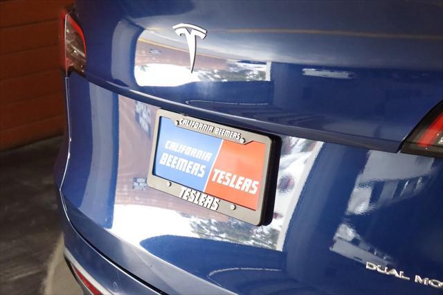 Photo of 2022 Deep Blue Metallic Tesla Model Y