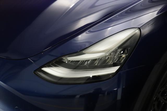 Photo of 2022 Deep Blue Metallic Tesla Model Y