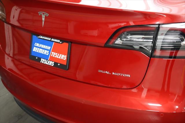 Photo of 2022 Red Multi-Coat Tesla Model 3