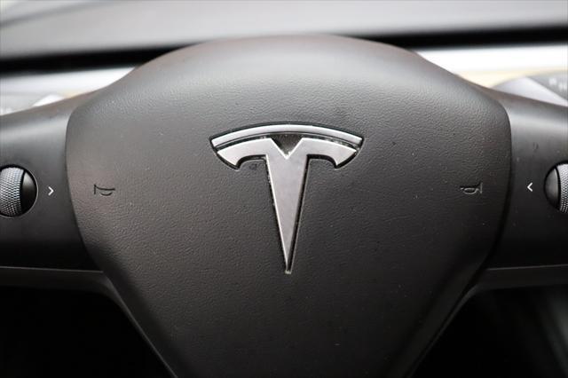 Photo of 2022 Red Multi-Coat Tesla Model 3
