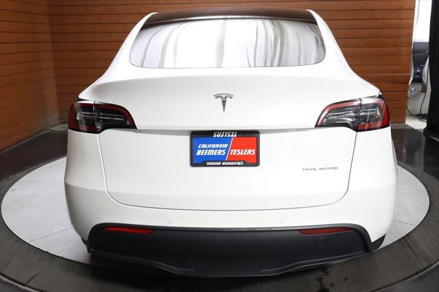 Photo of 2022 Pearl White Multi-Coat Tesla Model Y