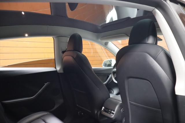 Photo of 2022 Pearl White Multi-Coat Tesla Model Y