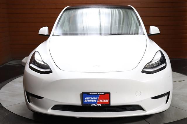 Photo of 2022 Pearl White Multi-Coat Tesla Model Y