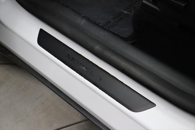 Photo of 2022 Pearl White Multi-Coat Tesla Model Y