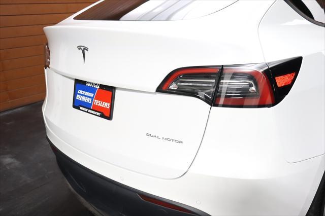 Photo of 2022 Pearl White Multi-Coat Tesla Model Y