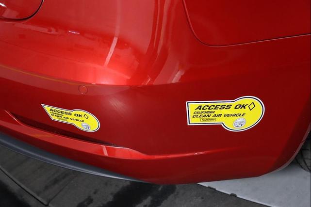 Photo of 2022 Red Multi-Coat Tesla Model 3