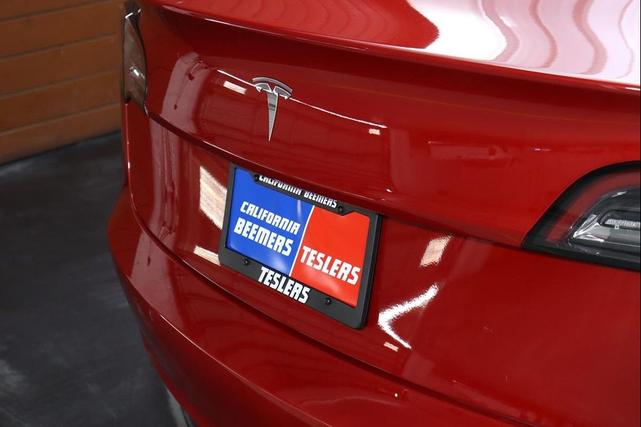 Photo of 2022 Red Multi-Coat Tesla Model 3