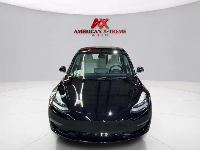 Photo of 2019 Solid Black Tesla Model 3