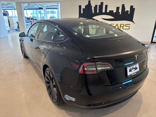 Photo of 2021 Black Tesla Model 3