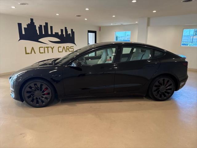 Photo of 2021 Black Tesla Model 3