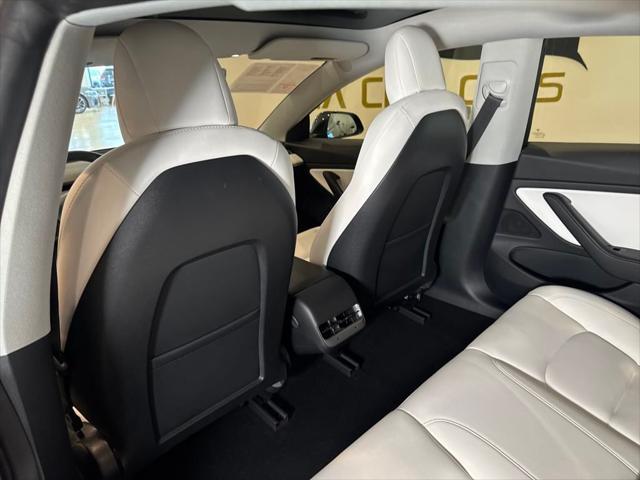 Photo of 2021 Black Tesla Model 3