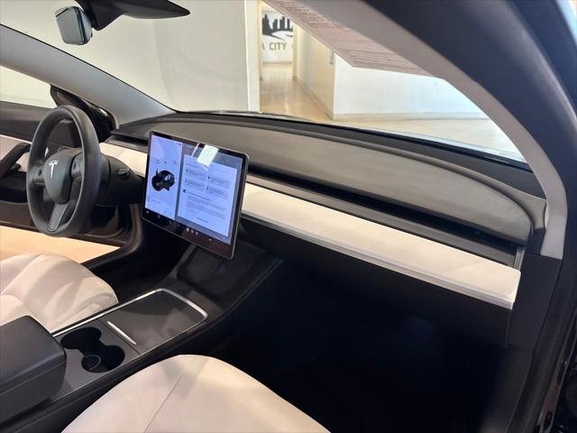 Photo of 2021 Black Tesla Model 3