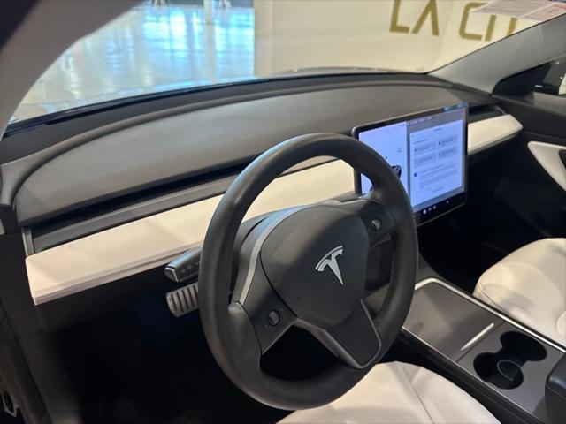 Photo of 2021 Black Tesla Model 3