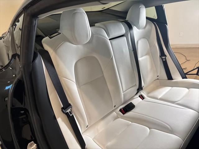 Photo of 2021 Black Tesla Model 3