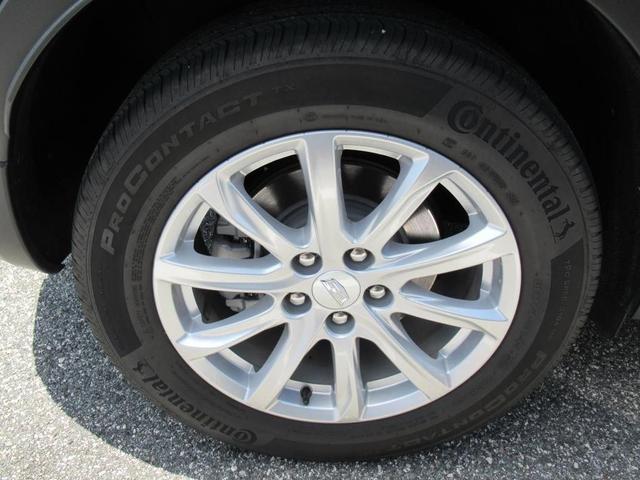 Photo of 2023 Stellar Black Metallic Cadillac XT4