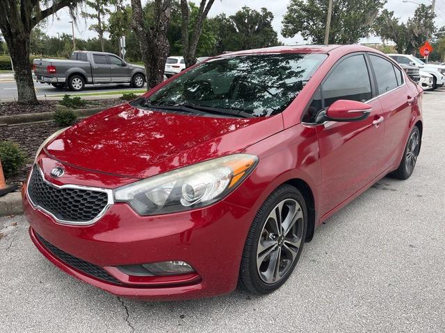 Photo of 2016 Crimson Red Metallic Kia Forte