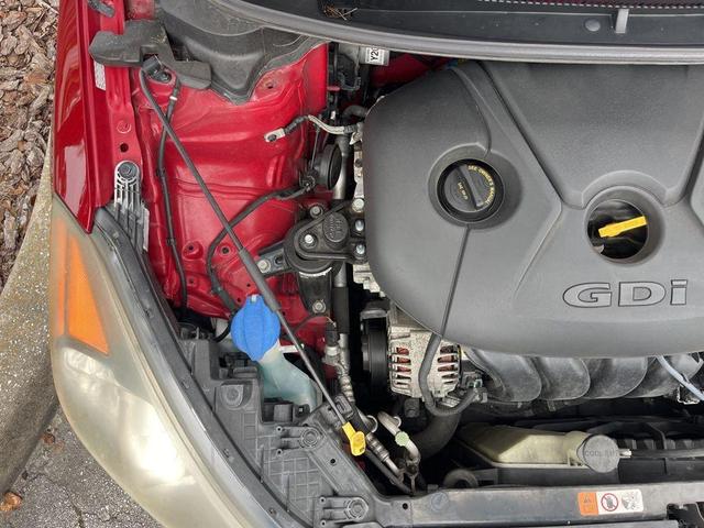 Photo of 2016 Crimson Red Metallic Kia Forte