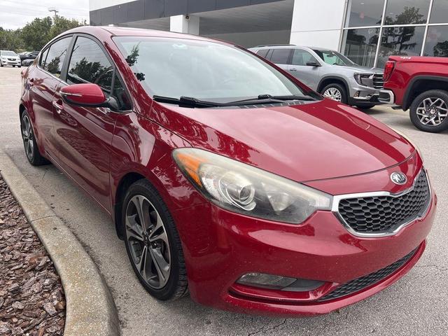 Photo of 2016 Crimson Red Metallic Kia Forte