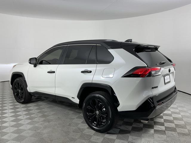 Photo of 2022 Blizzard Pearl/Midnight Black Metallic Toyota RAV4 Hybrid