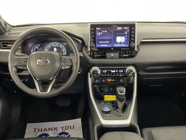 Photo of 2022 Blizzard Pearl/Midnight Black Metallic Toyota RAV4 Hybrid