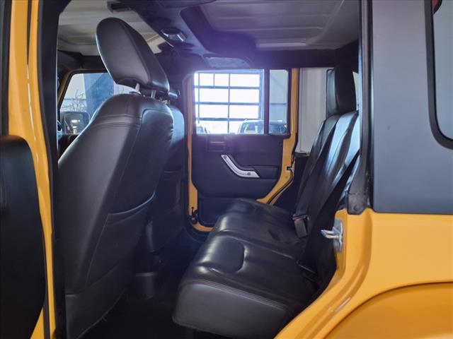 Photo of 2015 Baja Yellow Jeep Wrangler Unlimited