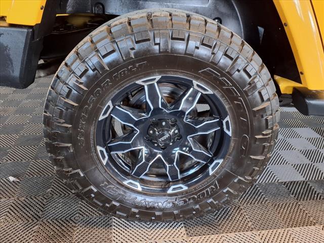 Photo of 2015 Baja Yellow Jeep Wrangler Unlimited