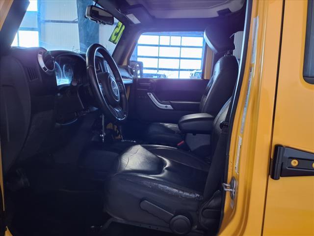 Photo of 2015 Baja Yellow Jeep Wrangler Unlimited