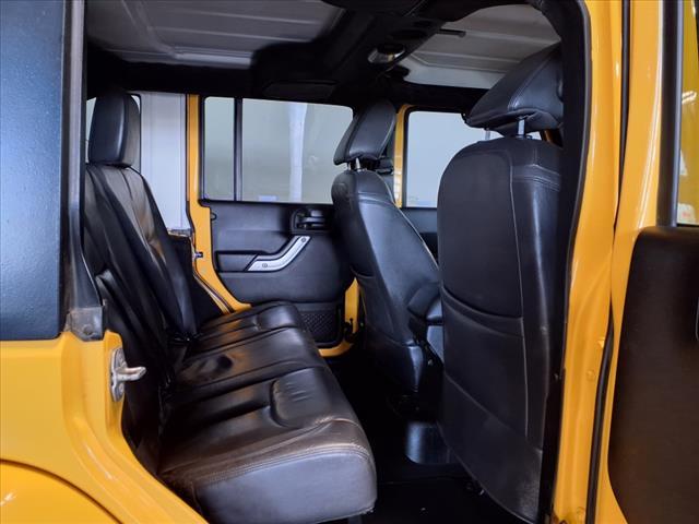 Photo of 2015 Baja Yellow Jeep Wrangler Unlimited