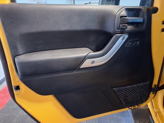 Photo of 2015 Baja Yellow Jeep Wrangler Unlimited