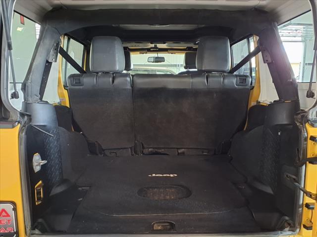 Photo of 2015 Baja Yellow Jeep Wrangler Unlimited