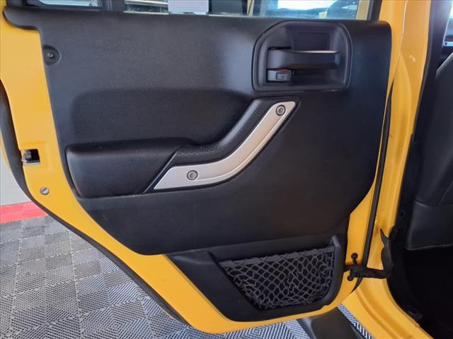 Photo of 2015 Baja Yellow Jeep Wrangler Unlimited