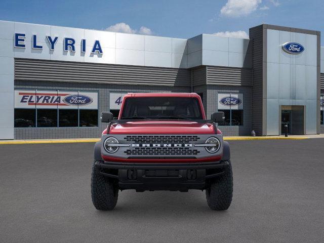 Photo of 2025 Ruby Red Metallic Tinted Clearcoat Ford Bronco