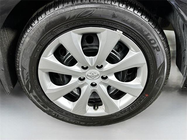 Photo of 2024 Midnight Black Metallic Toyota Corolla