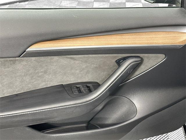 Photo of 2022 Solid Black Tesla Model 3