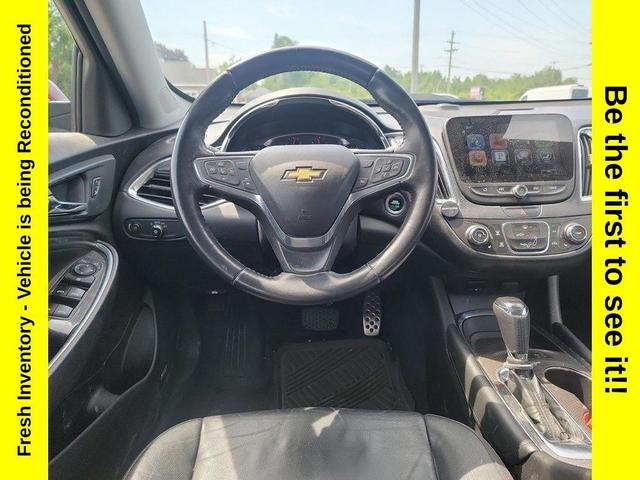 Photo of 2016 Butte Red Metallic Chevrolet Malibu