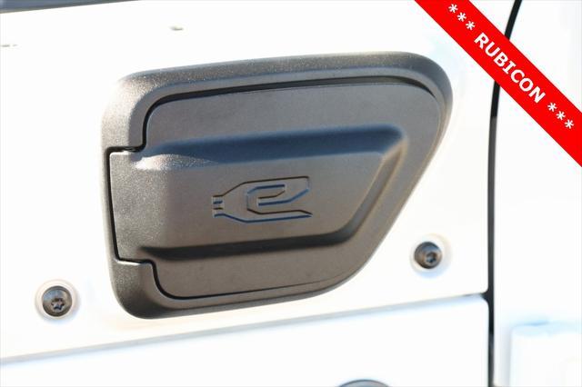 Photo of 2022 Bright White Clearcoat Jeep Wrangler Unlimited 4xe