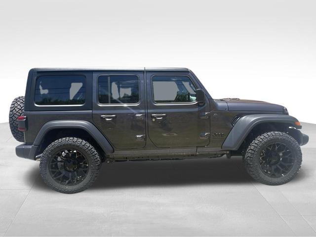 Photo of 2025 Granite Crystal Metallic Clearcoat Jeep Wrangler
