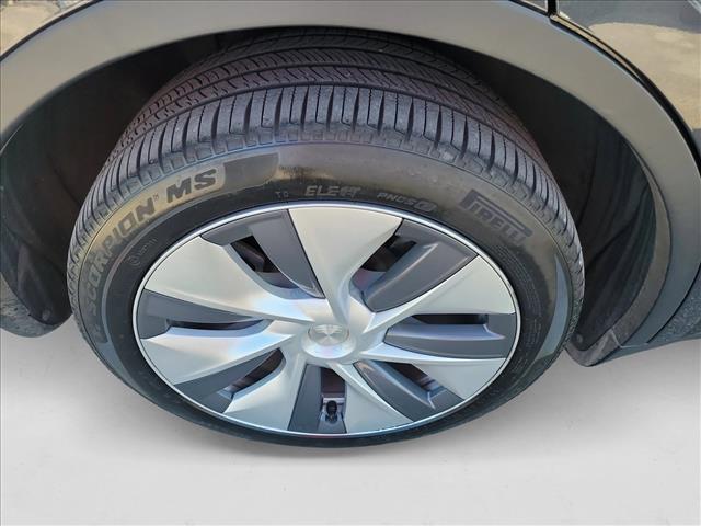 Photo of 2024 Deep Blue Metallic Tesla Model Y