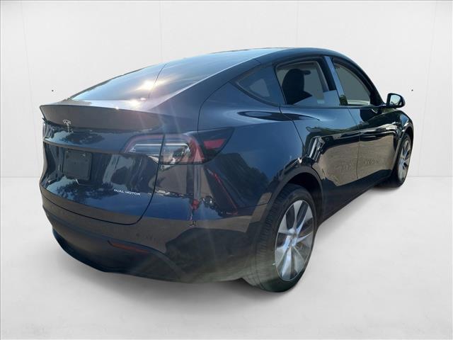 Photo of 2024 Deep Blue Metallic Tesla Model Y