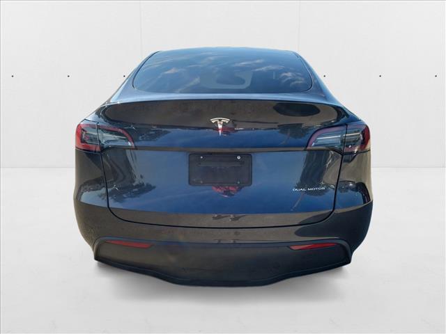 Photo of 2024 Deep Blue Metallic Tesla Model Y