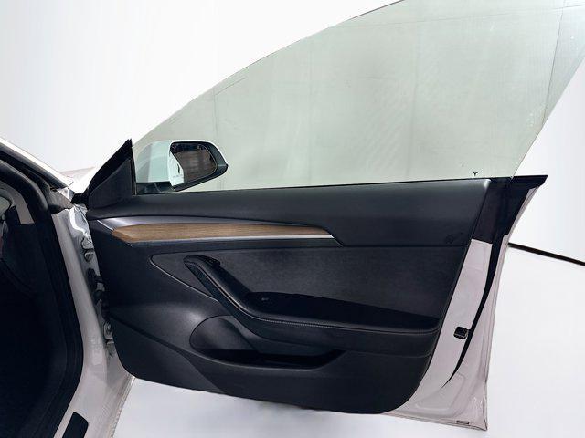 Photo of 2021 Pearl White Multi-Coat Tesla Model 3