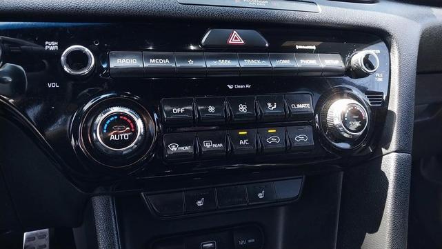 Photo of 2021 Black Cherry Pearl Kia Sportage