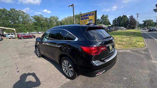 Photo of 2014 Crystal Black Pearl Acura MDX
