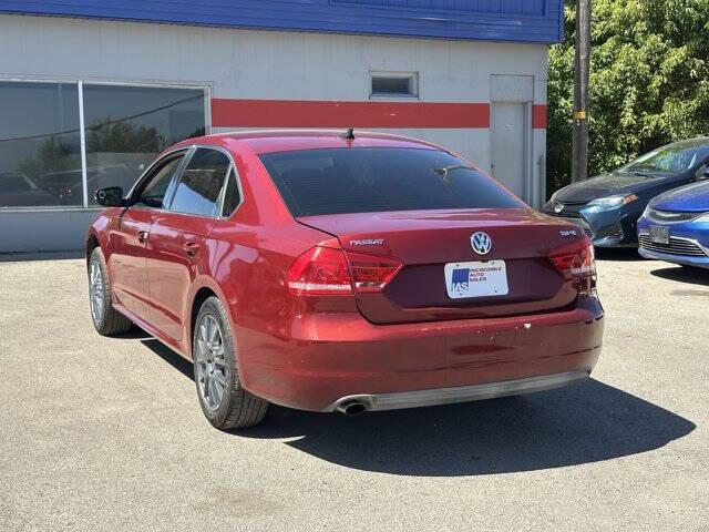 Photo of 2015 Fortana Red Volkswagen Passat