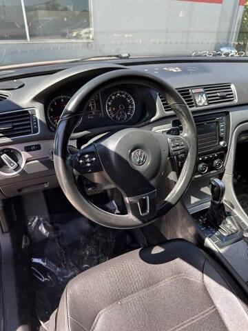 Photo of 2015 Fortana Red Volkswagen Passat